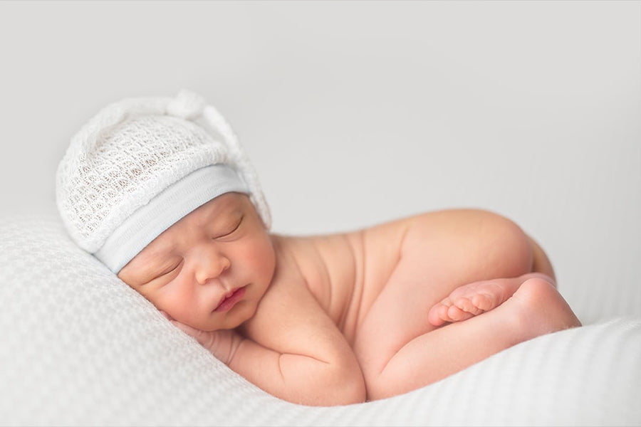 Newborn On White - Meg Bitton Productions