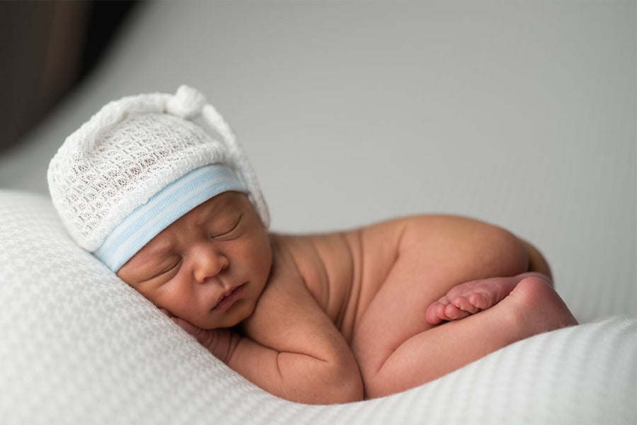 Newborn On White - Meg Bitton Productions